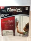 Master Lock Universal Smarttouch Finger Activated Garage Door Opener Sealed. Fixed Price $30.36.