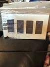 Cooper PJS264V Four Gang Screwless Wallplate New!!!. Fixed Price $7.00.