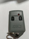 Dks LSD8068TX Two Buttons Garage Gate Door Opener Replacement Transmitter Tested. Fixed Price $32.00.