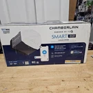 Chamberlain B2211T 1/2 Hp Smart Quiet Belt Drive Garage Door Opener W/ Battery. Fixed Price $173.99.