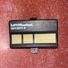 Liftmaster Security + Button Remote Model: 102 619 - 973LM HBW1241. Fixed Price $14.59.
