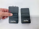 (2) Genie Intellicode Acsgt Type 1 Black 390 Mhz Garage Door Opener Remotes. Fixed Price $39.00.