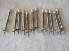 National Hardware 3" Spring Door Stopper W/ Rubber TIP-12 Pack. Fixed Price $7.95.