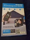 Atomi Smart Garage Door Opener, (brand New) Sealed!. Fixed Price $21.00.