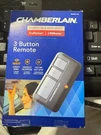 Chamberlain 953EV-P2 Button Garage Door Remote Black Opened Box 3433OB. Fixed Price $29.99.