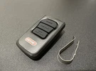 Genie Overhead Door (3-BUTTON) Garage & Gate Remote Opener GM3T W/battery. Fixed Price $20.00.